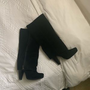 Tall fold over black leather boots